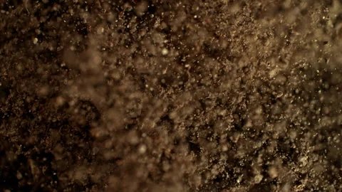 Super Slow Motion Shot of Exploding Soil Towards Camera at 1000fps. 库存影片 325711711