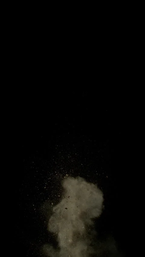 Super Slow Motion Shot of Exploding Soil, Rocks and Dust Isolated on Black at Stock Footage 326933498