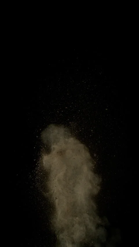 Super Slow Motion Shot of Exploding Soil, Rocks and Dust Isolated on Black at Stock Footage 327421692