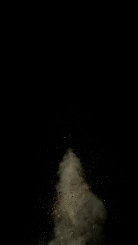 Super Slow Motion Shot of Exploding Soil, Rocks and Dust Isolated on Black at Stock Footage 328029736