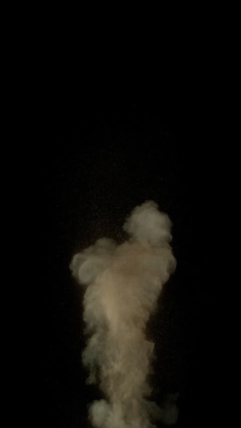 Super Slow Motion Shot of Exploding Dust ang Soil Isolated on Black at 1000fps. Stock Footage 328586503