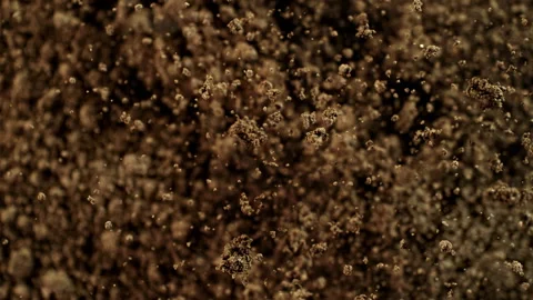 Super Slow Motion Shot of Exploding Soil Towards Camera at 1000fps. 库存影片 329072371