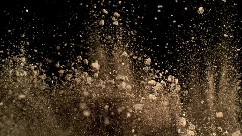 Super Slow Motion Shot of Exploding Soil with Rocks Camera at 1000fps. Stock Footage 334031210