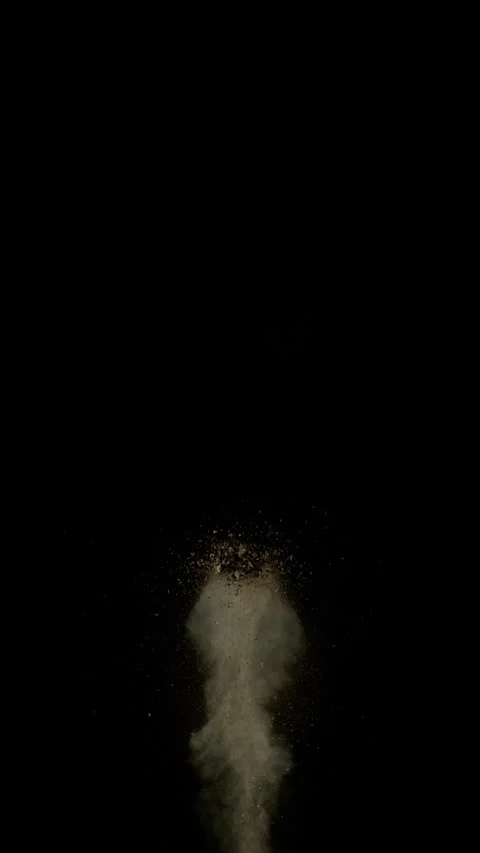 Super Slow Motion Shot of Exploding Soil, Rocks and Dust Isolated on Black at Stock Footage 334032498