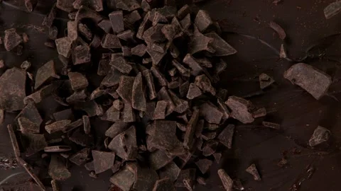 Super Slow Motion Shot of Falling Chocolate Pieces at 1000 fps. Stock Footage 147078754
