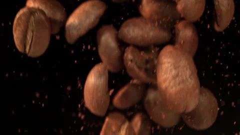 Super Slow Motion Shot of Falling Coffee Beans and Ground Coffee Isolated on Stock Footage 341830696