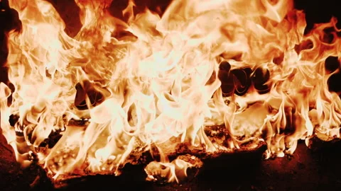 Super Slow Motion Shot of Fire Flames Isolated on Black Background. Stock Footage 147353051