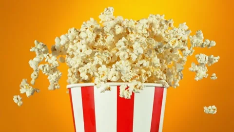 Super Slow Motion Shot of Fluffy Popcorn Exploding from Bucket at 1000fps. Stock Footage 261755063
