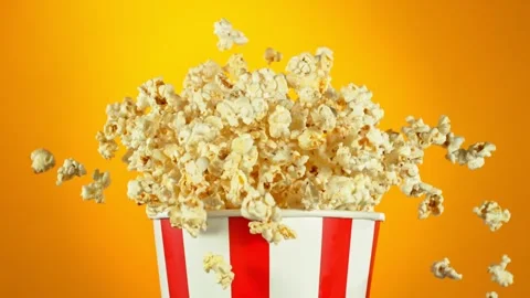 Super Slow Motion Shot of Fluffy Popcorn Exploding from Bucket at 1000fps. Stock Footage 263078253