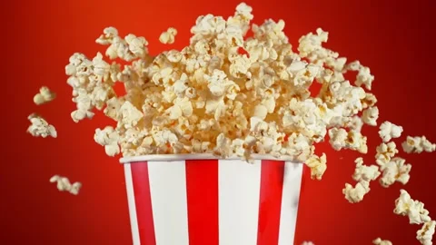 Super Slow Motion Shot of Fluffy Popcorn Exploding from Bucket at 1000fps. Stock Footage 263561008