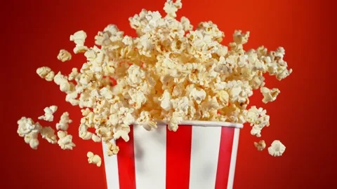Super Slow Motion Shot of Fluffy Popcorn Exploding from Bucket at 1000fps. Stock Footage 263882919