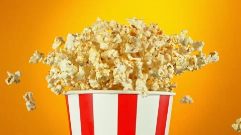 Super Slow Motion Shot of Fluffy Popcorn Exploding from Bucket at 1000fps. Stock Footage 263987276