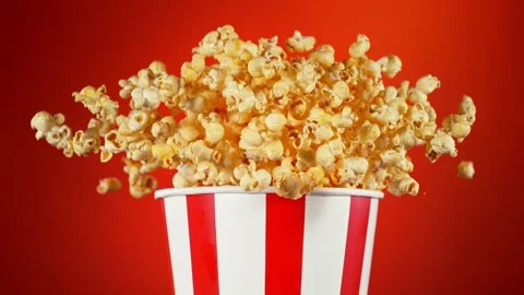 Super Slow Motion Shot of Fluffy Flavoured Popcorn Exploding from Bucket at Stock Footage 264028930