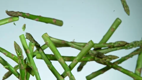 Super Slow Motion Shot of Flying Asparagus Video stock 137315340