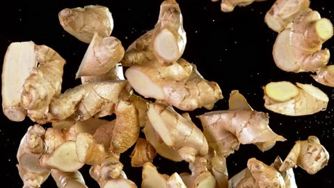 Super Slow Motion Shot of Flying Fresh Ginger Cuts at 1000 fps. Video stock 159101798