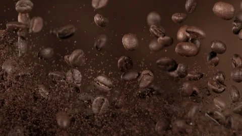 Super Slow Motion Shot of Flying Premium Coffee Beans and Ground Coffee at 库存影片 278259855