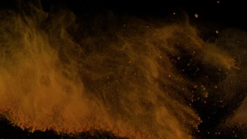 Super Slow Motion Shot of Flying Orange Powder Isolated on Black Background at 動画素材 336252159