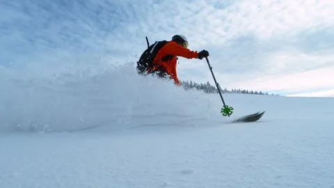 Super Slow Motion Shot of Freeride Skier Splashing Snow on Camera at 1000fps. Stock Footage 297746500