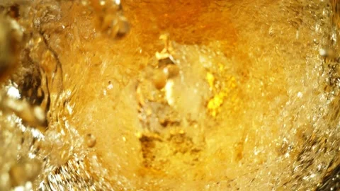 Super Slow Motion Shot of Fresh Beer Whirling in Glass Bottle at 1000fps. Stock Footage 171576495