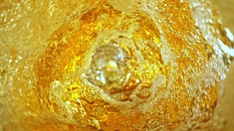 Super Slow Motion Shot of Fresh Beer Whirling inside Glass Bottle at 1000fps. Stock Footage 260846516