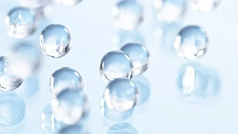 Super Slow motion Shot of Hydrogel Balls Bouncing on Glass at 1000fps. Stock Footage 162351851