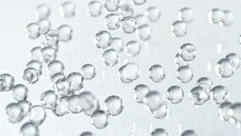 Super Slow motion Shot of Hydrogel Balls Bouncing on Glass at 1000fps. Stock Footage 164901671