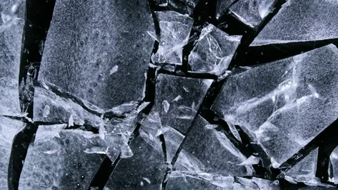 Super Slow Motion Shot of Ice Breaking at 1000 fps. Stock Footage 146041282