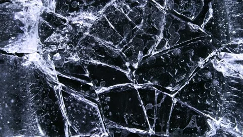 Super Slow Motion Shot of Ice Breaking at 1000 fps. Stock Footage 147938841