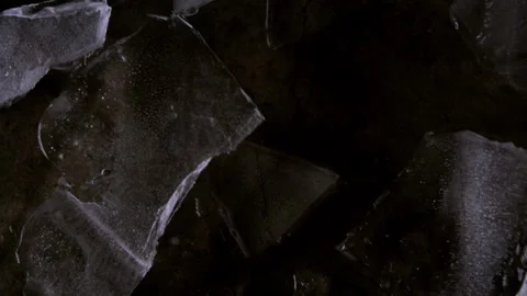 Super Slow Motion Shot of Ice Falling to a Concrete Floor Stock Footage 270401837