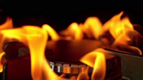 Super Slow Motion Shot of Igniting gas Stove at 1000 fps. Video stock 140974681