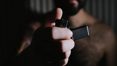 Super Slow Motion Shot of Igniting Metallic Lighter Stock Footage 145776608