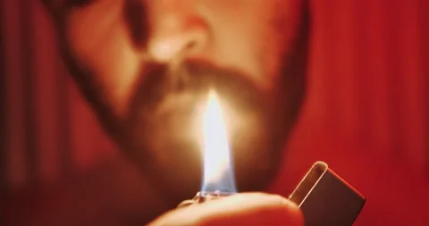 Super Slow Motion Shot of Igniting Metallic Lighter Stock Footage 145776708