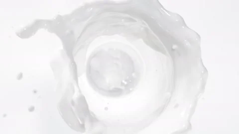Super Slow Motion Shot of Milk Vortex Splash Isolated on White Background at Stock Footage 147076582