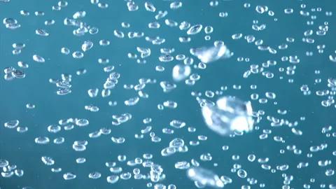 Super Slow Motion Shot of Moving Bubbles on Blue Background  1000fps Stock Footage 270753721
