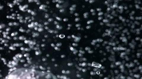 Super Slow Motion Shot of Moving Bubbles on Back Background  1000fps Stock Footage 270754178