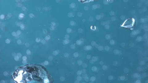 Super Slow Motion Shot of Moving Bubbles on Blue Background 1000fps Stock Footage 316250185