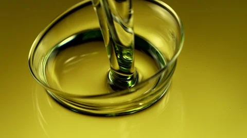 Super Slow Motion Shot of Pouring Olive Oil at 1000fps. Stock Footage 124891759