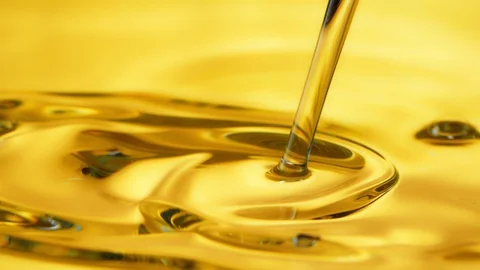 Super Slow Motion Shot of Pouring Oil Liquid at 1000fps. Stock Footage 125024909