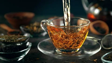 Super Slow Motion Shot of Pouring Tea at 1000 fps with Still Life Background. Stock Footage 136550524