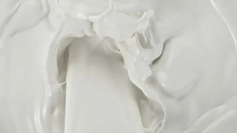 Super Slow Motion Shot of Pouring and Splashing Fresh Milk at 1000fps. Stock Footage 247854004