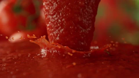 Super Slow Motion Shot of Pouring and Splashing Tomato Puree at 1000fps. Stock Footage 296740601
