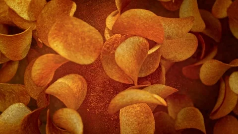 Super Slow Motion Shot of Premium Potato Chips And Seasoning Powder Explosion at Stock Footage 263554481