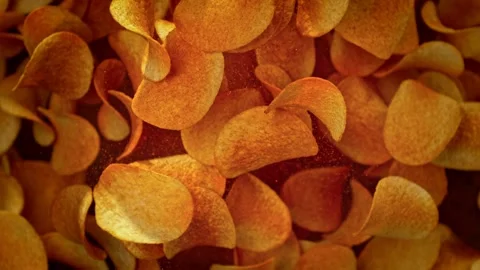Super Slow Motion Shot of Premium Potato Chips And Seasoning Powder Explosion at Stock Footage 263885246