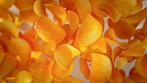 Super Slow Motion Shot of Premium Potato Chips with Seasoning Explosion Towards Stock Footage 271176961