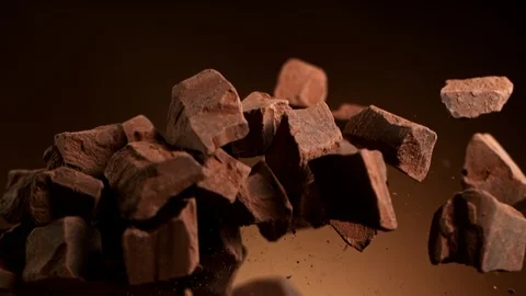 Super Slow Motion Shot of Raw Chocolate Chunks after Being Exploded at 1000fps. Video stock 120368436