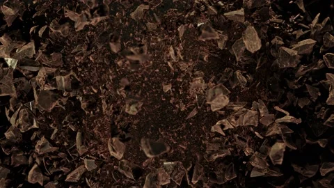 Super Slow Motion Shot of Raw Chocolate Chunks after Being Exploded at 1000fps. Video stock 137407803