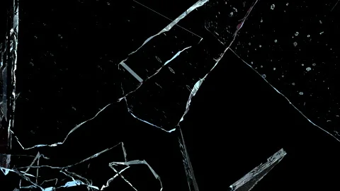 Super Slow Motion Shot of Real Glass Break Isolated on Black Background. Stock Footage 172429040