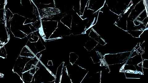 Super Slow Motion Shot of Real Glass Break Isolated on Black Background. Stock Footage 172429128