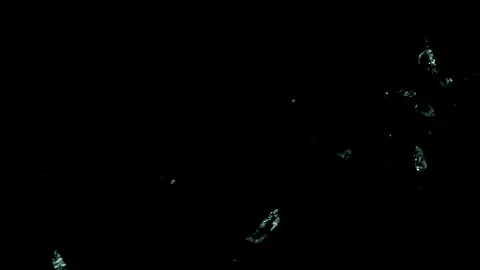 Super Slow Motion Shot of Real Glass Break Isolated on Black Background. Stock Footage 172429216