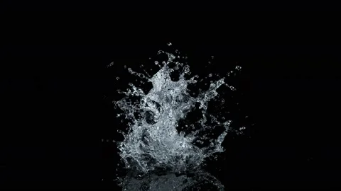 Super Slow Motion Shot of Real Water Splash Explosion from Surface Isolated on Stock Footage 221363627
